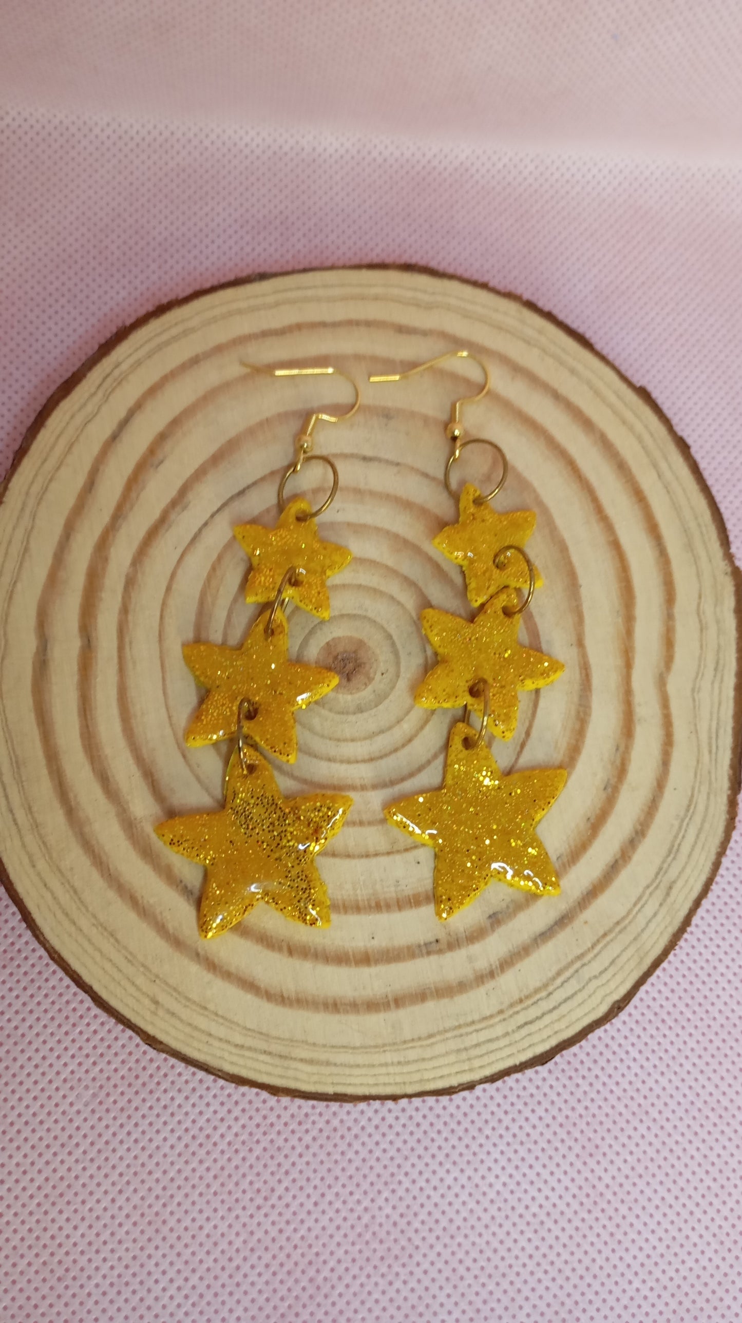 Estrellas purpurina doradas