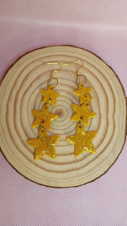 Estrellas purpurina doradas